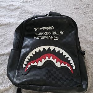 Sprayground Black and Red Shark Central Backpack